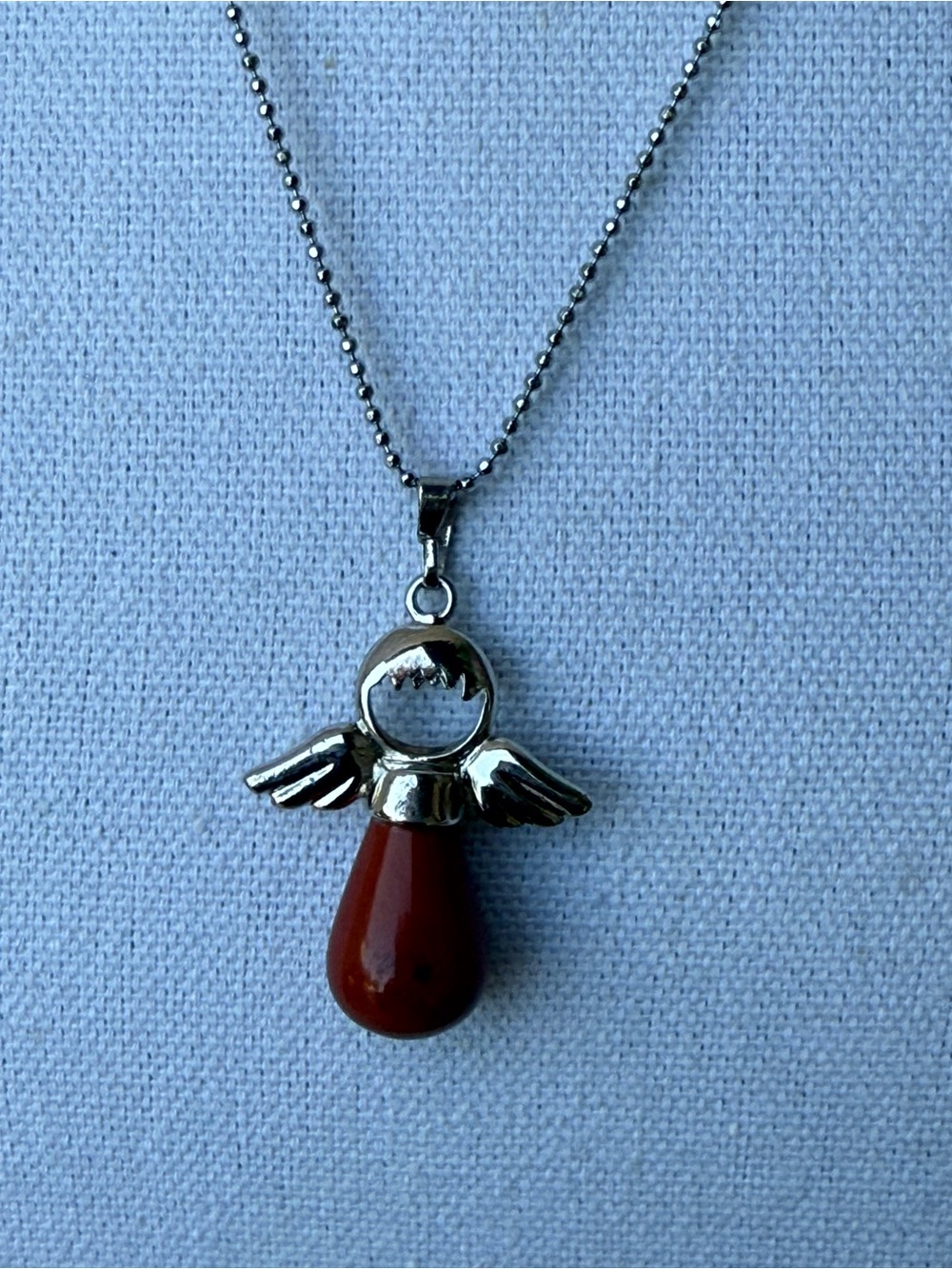 Silver Angel Pendant Necklace with Red Teardrop Stone